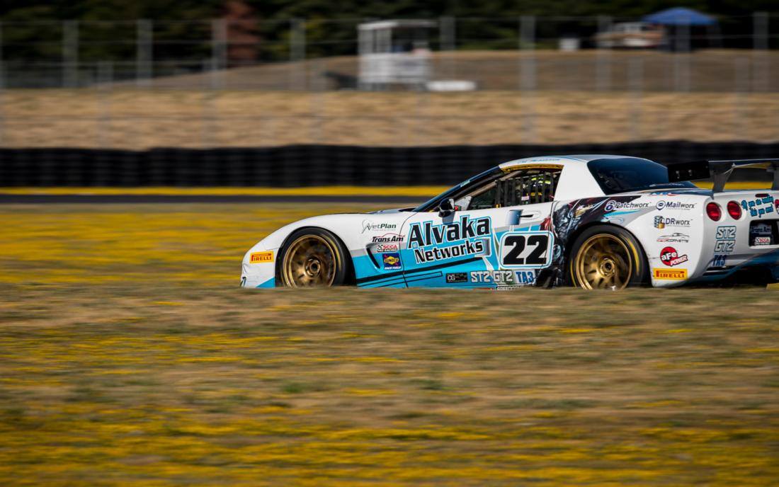 Alvaka Networks branded corvette driving on track