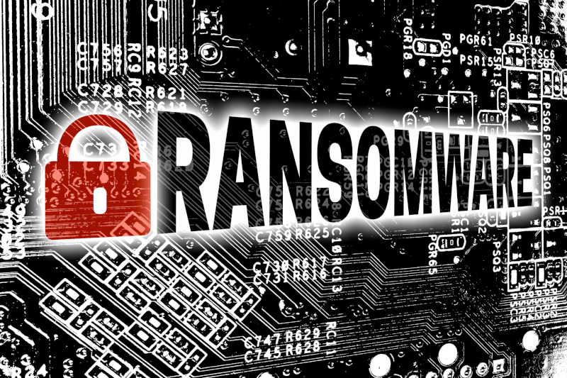 image of lock and ransomware spelled out on circuit board