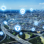 aerial view of city infrastructure with digital icons
