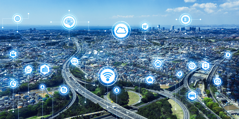 aerial view of city infrastructure with digital icons