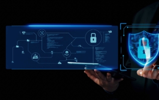 Supply chain ransomware security. A dark background highlights a person interacting with an advanced digital security interface. On the left side, a glowing, detailed diagram with interconnected elements and security icons represents complex cybersecurity planning. To the right is a glowing digital shield containing a padlock symbol, representing strong protection and defense against cyber threats.