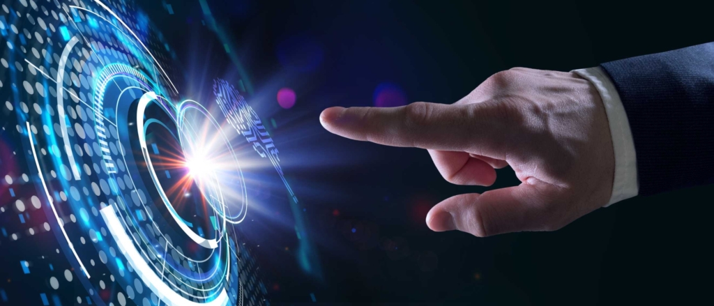 Encrypted Data Recovery Services. A suited hand reaches toward a glowing circular interface made of layered, rotating digital rings. The visual resembles high-tech touchscreens and suggests interaction with a secure digital system or dashboard.