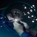 Biometric Security for Enterprises. Hands holding a tablet with a glowing globe and hexagonal digital icons in the air, representing global communication, data analytics, and digital services.