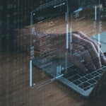 Red teaming ransomware defense. A close-up of hands typing on a laptop keyboard. Overlaid on top are transparent screens filled with lines of computer code, surrounded by faint glowing green numbers and symbols, creating a cybersecurity or hacking theme.