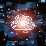 Secure IT Infrastructure Planning. A stylized glowing white cloud icon in the center, surrounded by a burst of lines and data icons (e.g., charts, envelopes, and media symbols) radiating outward. The background is black, suggesting cloud computing and data exchange.