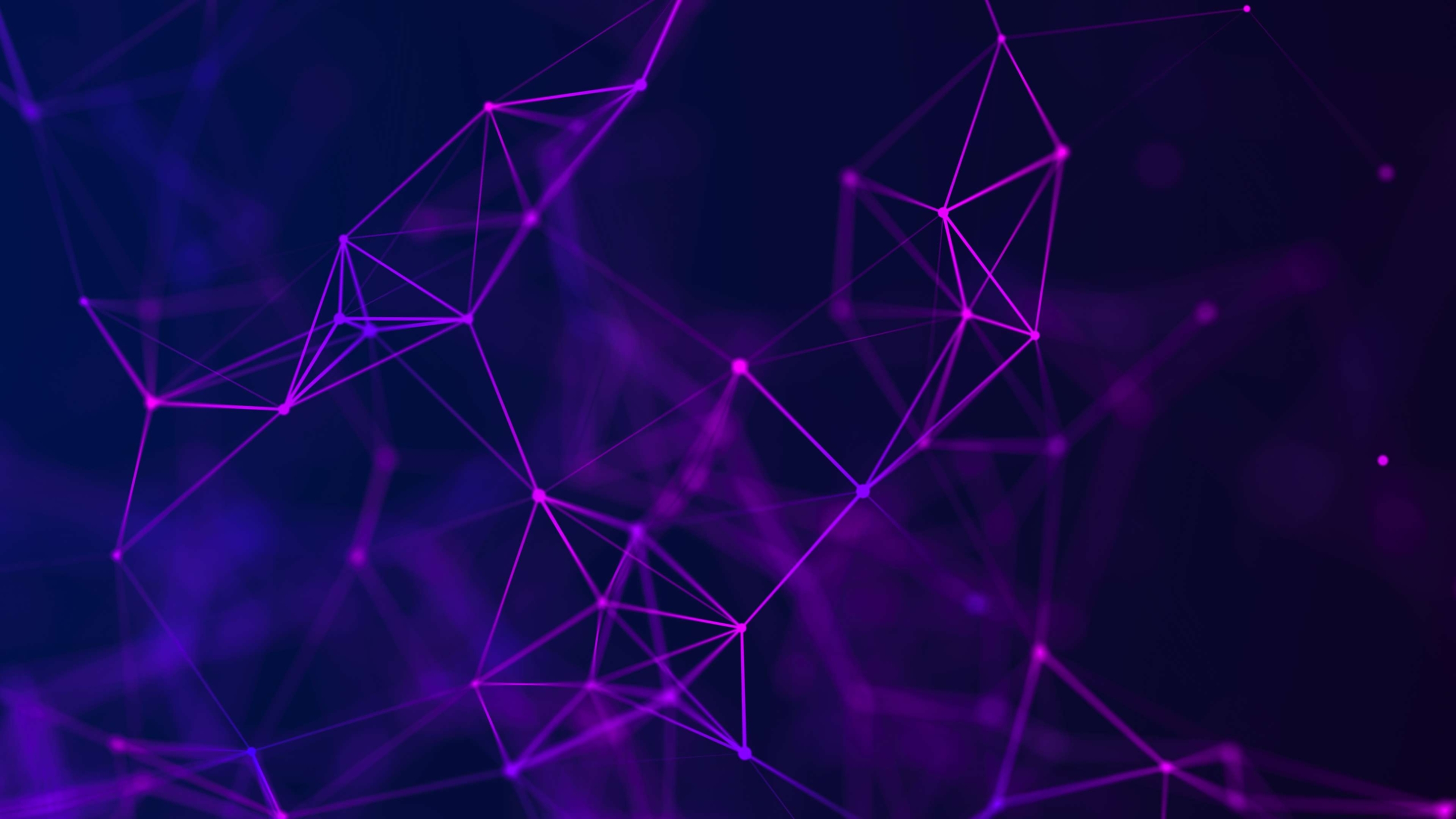 M&A ransomware risk assessment. A digital visualization of a deep blue and purple network of interconnected points and lines on a dark background. The web-like pattern represents data connections or a digital mesh, glowing with neon purple highlights.